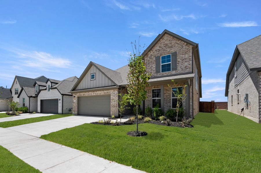 Representative exterior photo of a completed home built from the Freedom by Rockwell Homes in Wildflower Ranch, Justin, TX (Image 29).