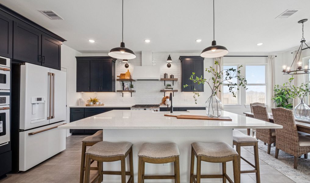 Kitchen with spacious central island & pendant lighting Kitchen with spacious central island & pendant lighting