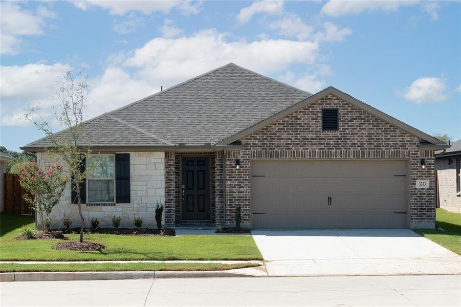 Front exterior of a new home in Churchill: Meadows 50', Anna, TX, highlighting curb appeal (Image 15). Front exterior of a new home in Churchill: Meadows 50', Anna, TX, highlighting curb appeal (Image 15).