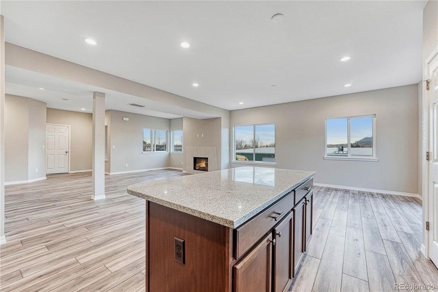 Bar-top kitchen island is perfect for quick meals, coffee sipping, and gathering.