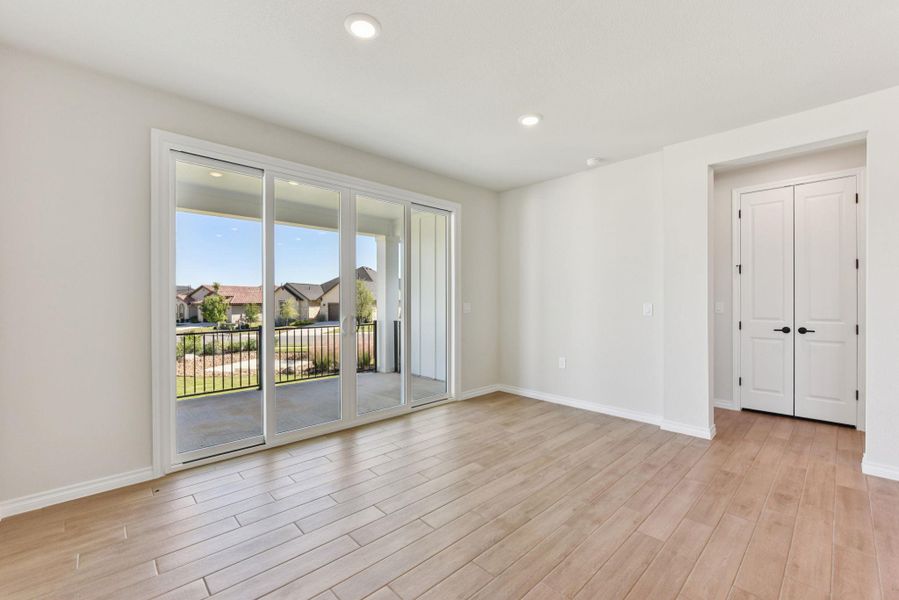 Empty room with recessed lighting and light wood-type flooring