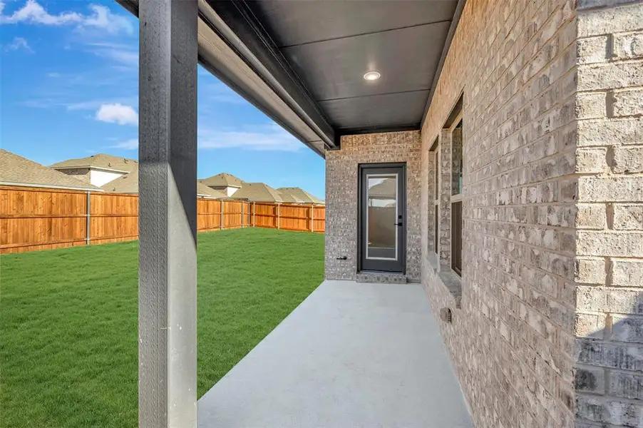 Exterior details and patio area of a home in Rolling Ridge, Van Alstyne (Image 2). Exterior details and patio area of a home in Rolling Ridge, Van Alstyne (Image 2).