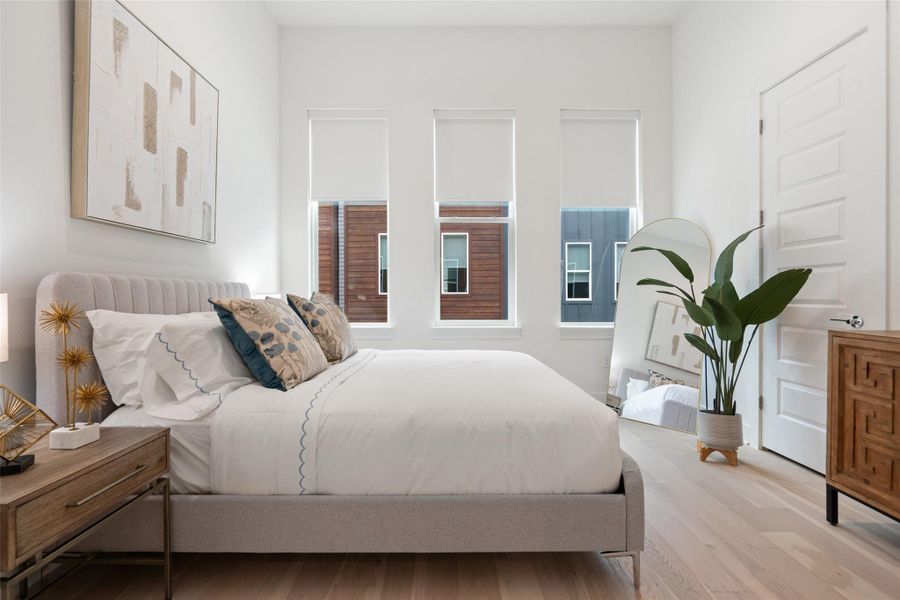 Bedroom with wood finished floors