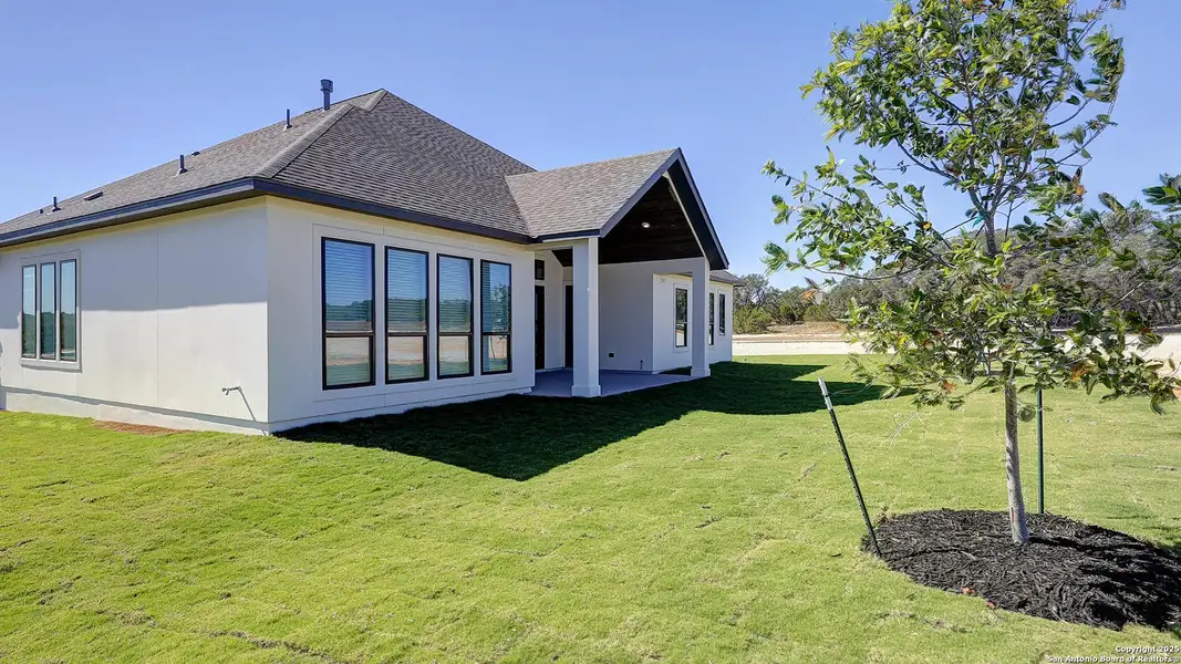 Exterior details and patio area of a home in George's Ranch Acre, Boerne (Image 3). Exterior details and patio area of a home in George's Ranch Acre, Boerne (Image 3).