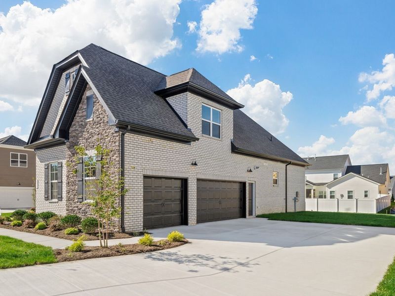 Front exterior of a new home in Shelton Square, Murfreesboro, TN, highlighting curb appeal (Image 26).