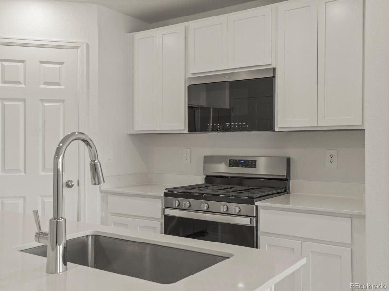 Furnished interior view inside a new home in Skyview at High Point, Aurora (Image 12).