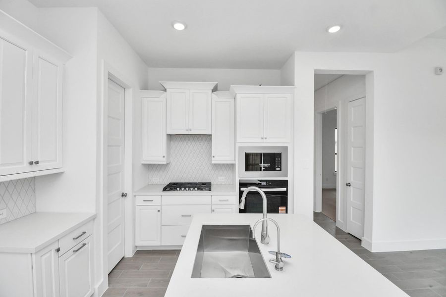 Furnished interior view inside a new home in Arabella on the Prairie: Signature Collection, Richmond (Image 9).