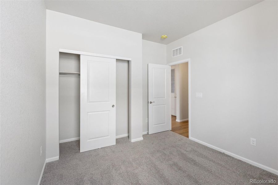 Spacious, unfurnished interior of a new home in The Legacy Collection at Talon Pointe, Thornton (Image 23).