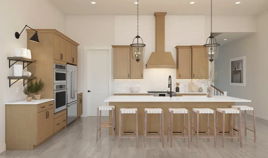 Kitchen with vast island & pendant lights