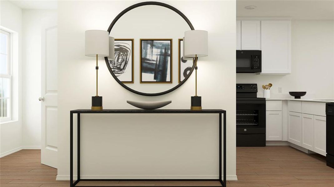 Room details with black appliances and wood-type flooring