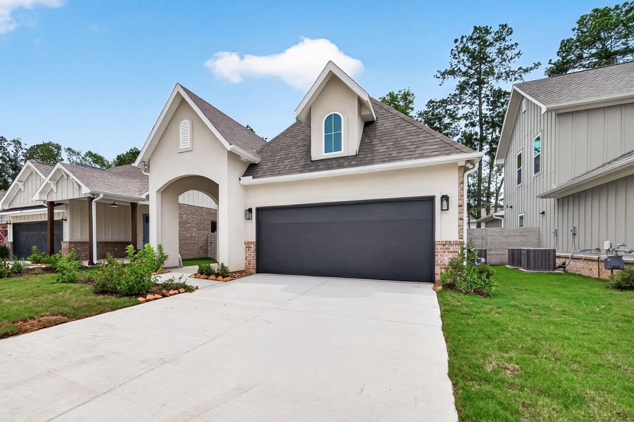 Front exterior of a new home in Two Step Farm, Montgomery, TX, highlighting curb appeal (Image 20).