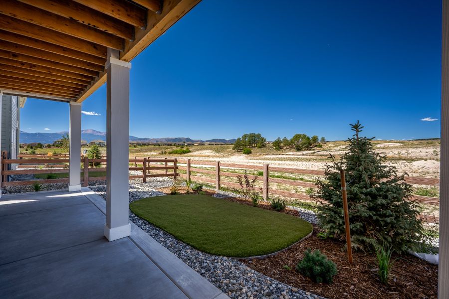 Exterior details and patio area of a home in Revel Crossing at Wolf Ranch - The Panorama Collection, Colorado Springs (Image 21). Exterior details and patio area of a home in Revel Crossing at Wolf Ranch - The Panorama Collection, Colorado Springs (Image 21).