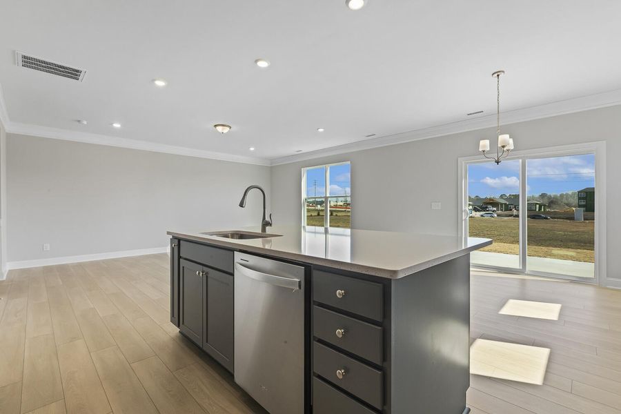 Furnished interior view inside a new home in 1158 Place, Wilson (Image 9).