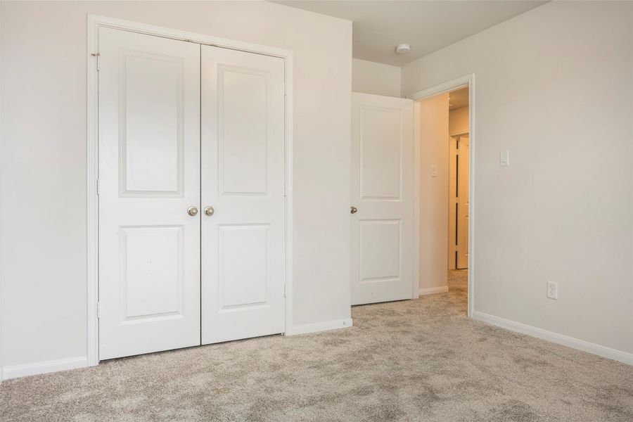 Spacious, unfurnished interior of a new home in Sunterra, Katy (Image 40).