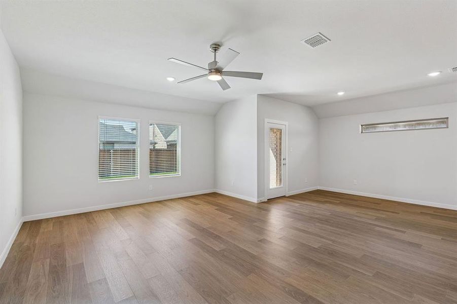 Living and Dining Room in the Harrison home plan by Trophy Signature Homes – REPRESENTATIVE PHOTO