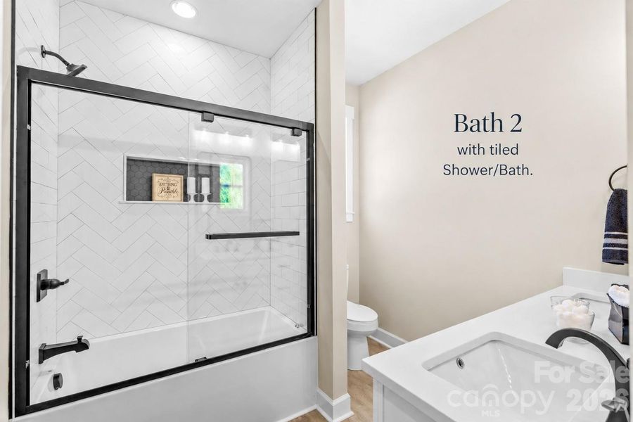 2nd Bath tiled Shower & Tub.