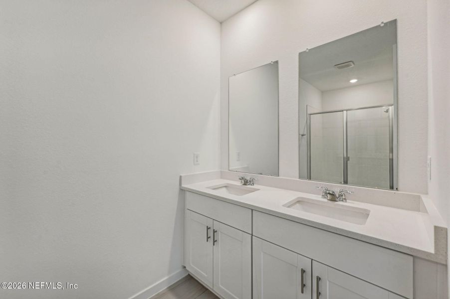 Furnished interior view inside a new home in Lakes at Bella Lago - Signature Series, Green Cove Springs (Image 10).