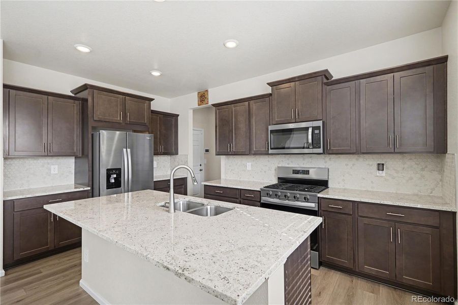 Furnished interior view inside a new home in Murphy Creek, Aurora (Image 12).
