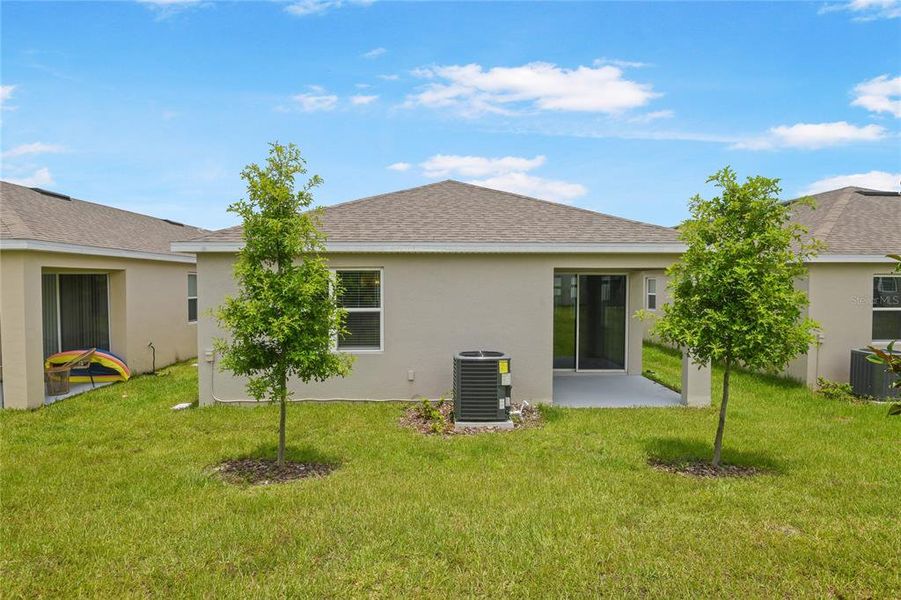 Front exterior of a new home in Seasons at Magnolia Pointe, Umatilla, FL, highlighting curb appeal (Image 16).