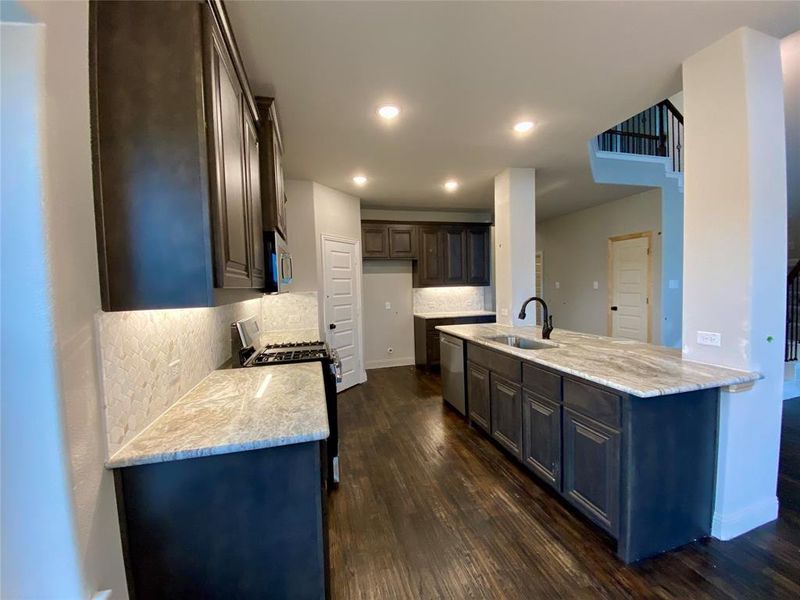 Listed home has White Quartz w/grey veins