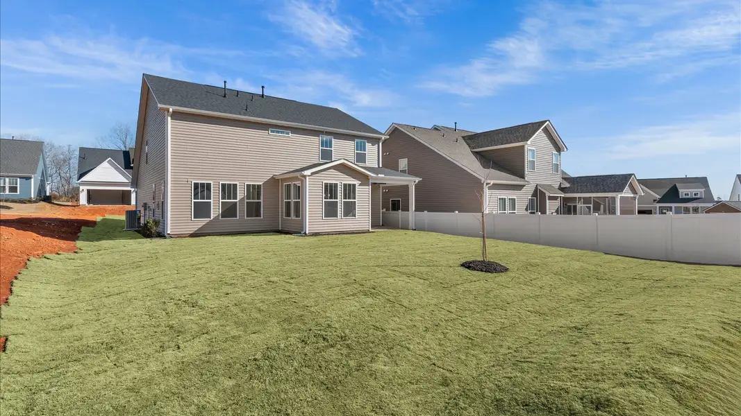 Exterior details and patio area of a home in Fox Hollow, Spartanburg (Image 4).