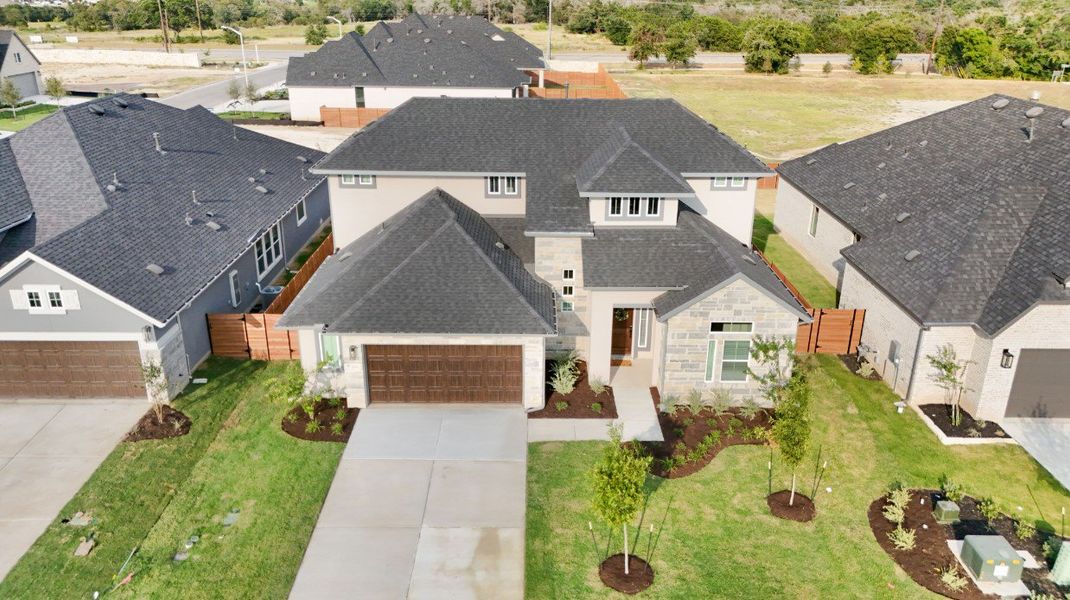Front exterior of a new home in Broken Oak, Georgetown, TX, highlighting curb appeal (Image 21).