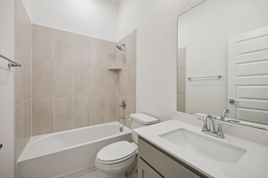 Bathroom in the Gilmour II home plan by Trophy Signature Homes – REPRESENTATIVE PHOTO