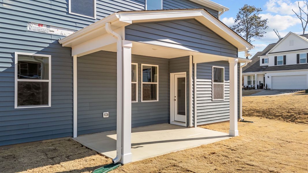 Exterior details and patio area of a home in Neill's Pointe, Angier (Image 22).