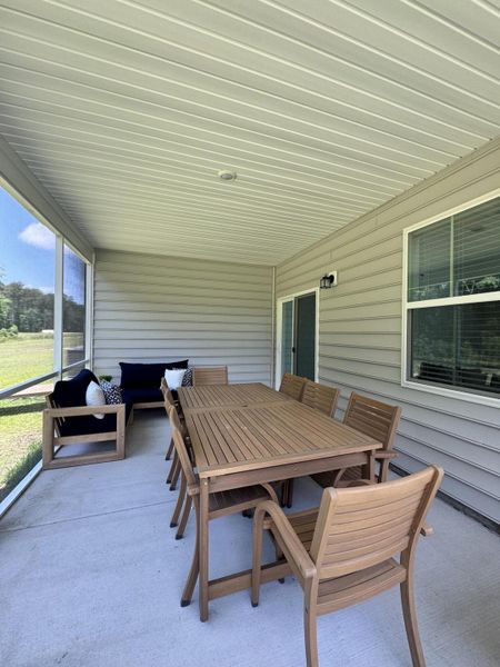 Exterior details and patio area of a home in Heron's Walk at Summers Corner: Arbor Collection, Summerville (Image 26).