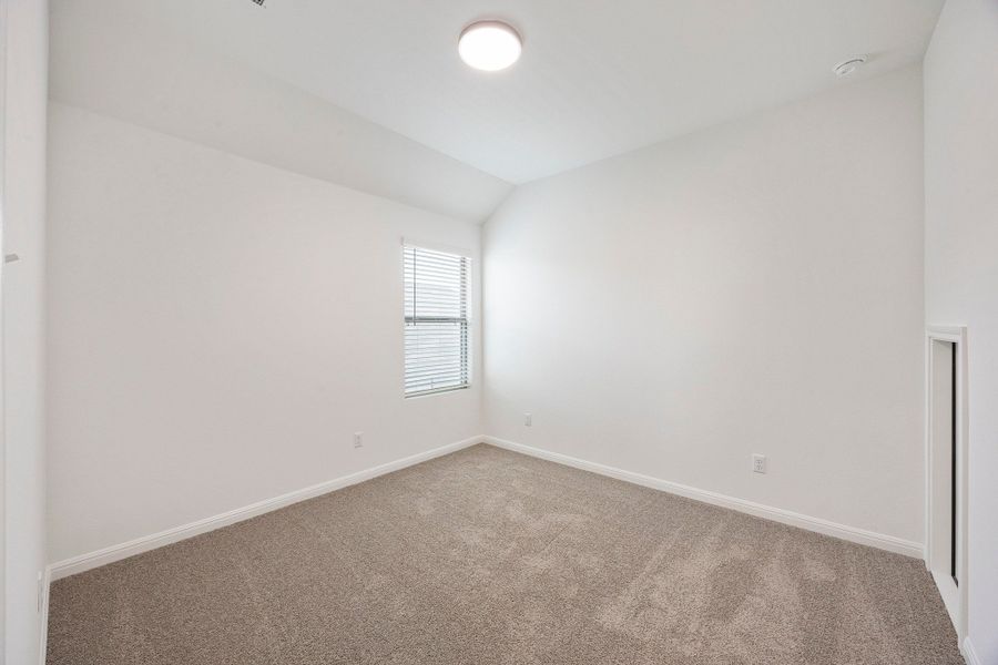 Bedroom in the Magnolia home plan by Trophy Signature Homes – REPRESENTATIVE PHOTO