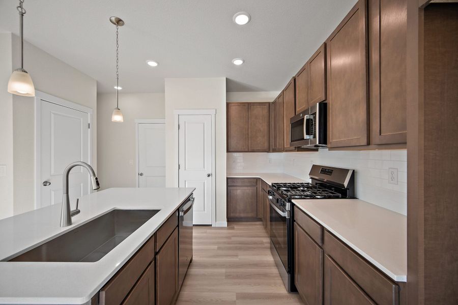 Furnished interior view inside a new home in Ridge at Lorson Ranch, Colorado Springs (Image 8).