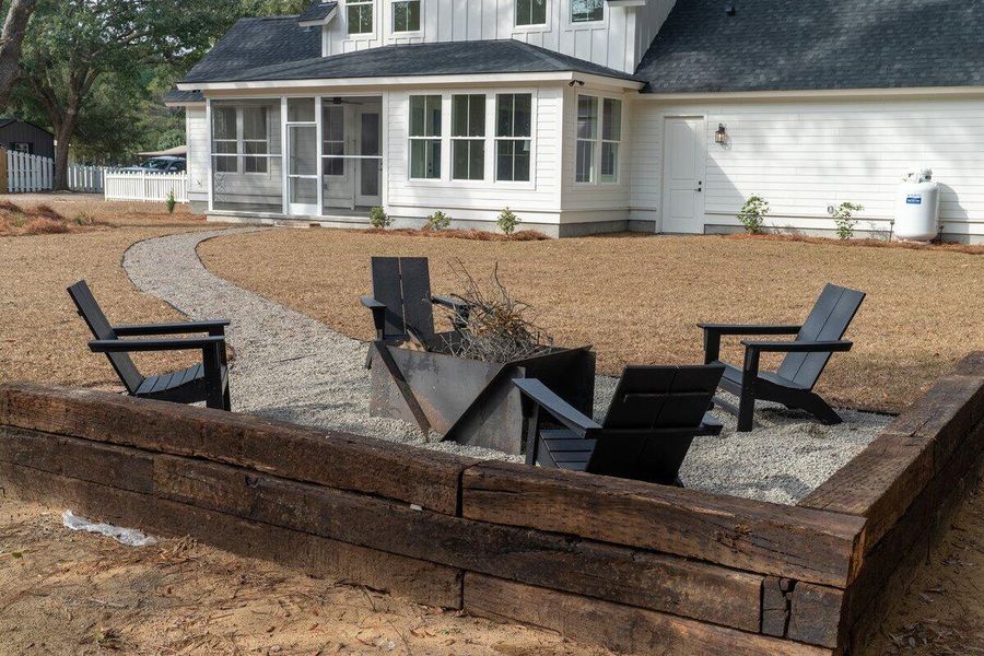 Exterior details and patio area of a home in , Awendaw (Image 29).