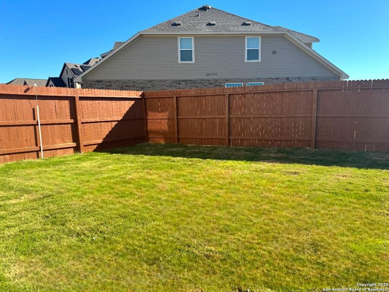 Exterior details and patio area of a home in Megan's Landing 50's, Castroville (Image 4).