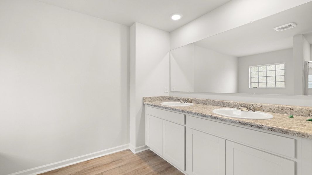 Representative furnished interior of a home built from the ROBIE by D.R. Horton in Northberry, Rome (Image 9).