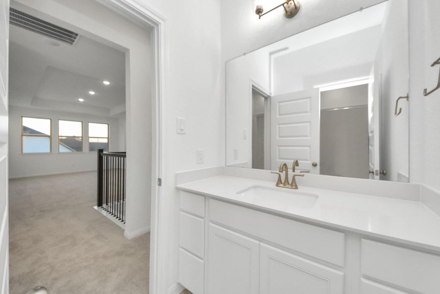 Furnished interior view inside a new home in Elyson, Katy (Image 8).