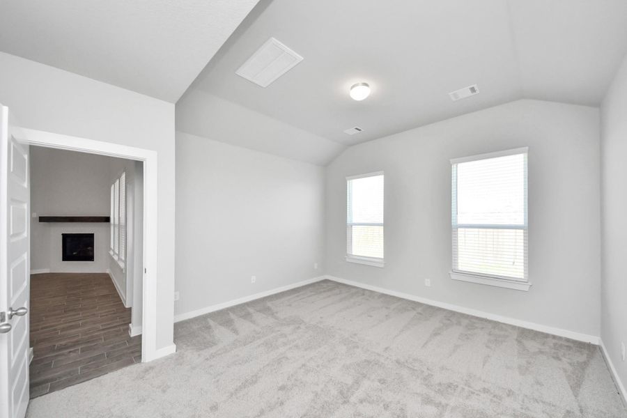 Another perspective unveils a comprehensive view of the serenity and comfort this primary suite offers. Another perspective unveils a comprehensive view of the serenity and comfort this primary suite offers.