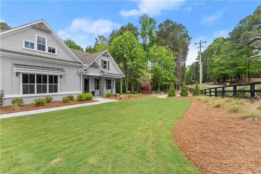 Front exterior of a new home in , Gainesville, GA, highlighting curb appeal (Image 30).