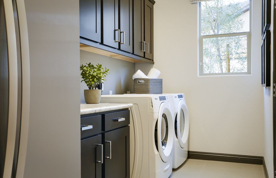 Laundry room with additional cabinet space