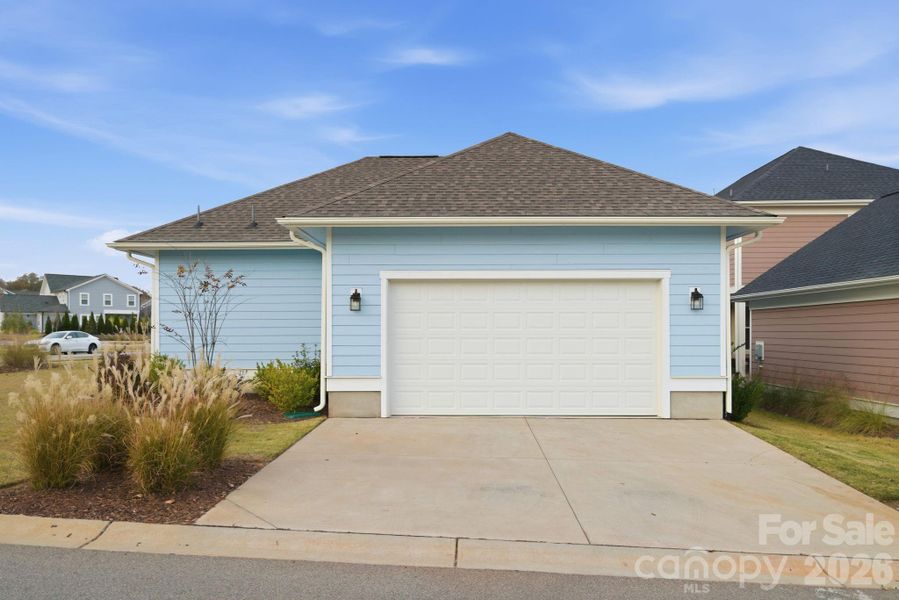 Front exterior of a new home in Riverwalk, Rock Hill, SC, highlighting curb appeal (Image 2). Front exterior of a new home in Riverwalk, Rock Hill, SC, highlighting curb appeal (Image 2).