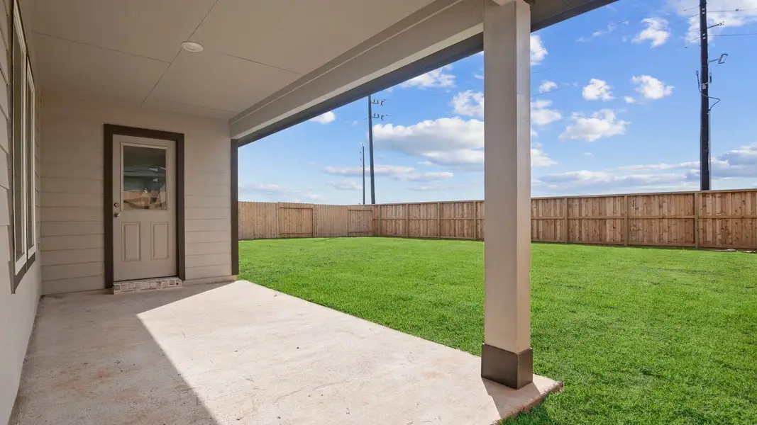 Exterior details and patio area of a home in Tamarron, Fulshear (Image 4).