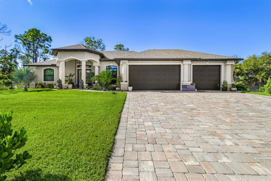 Front exterior of a new home in , Port Charlotte, FL, highlighting curb appeal (Image 20).