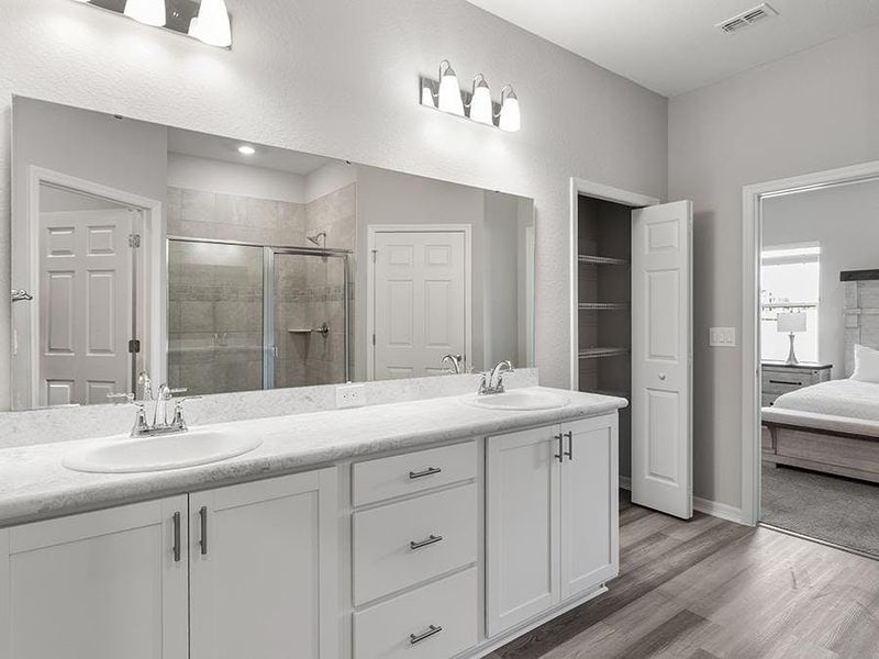 Your suite includes an en-suite bath with a large tiled shower - Aubrey by Highland Homes Your suite includes an en-suite bath with a large tiled shower - Aubrey by Highland Homes