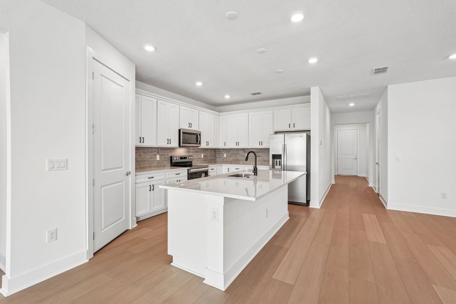 Furnished interior view inside a new home in Seaire, Parrish (Image 8).
