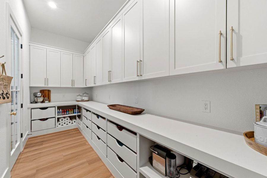 Amazing storage in this walk-in pantry. Amazing storage in this walk-in pantry.