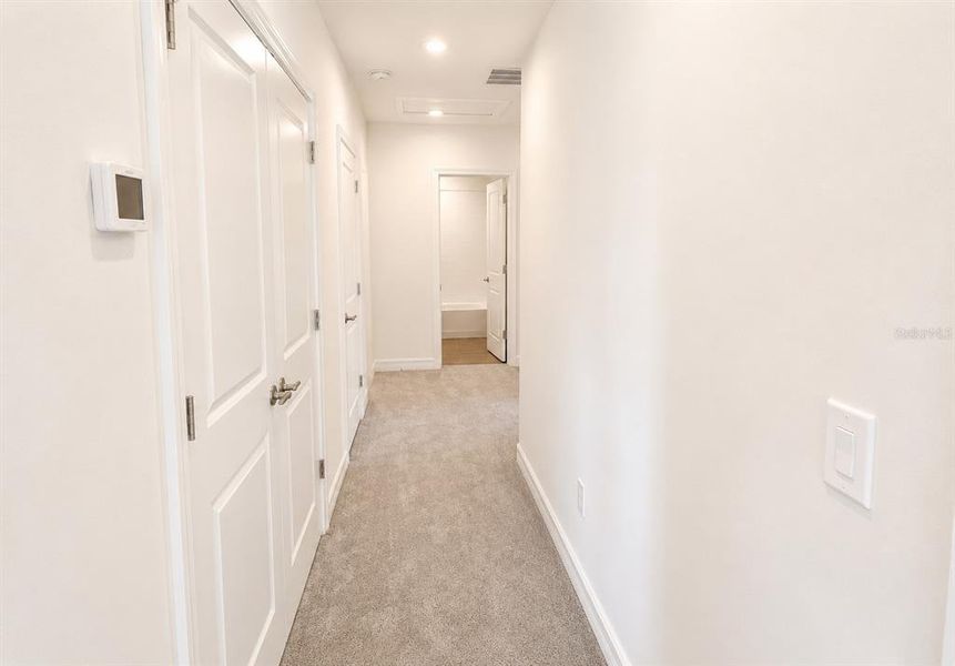 Spacious, unfurnished interior of a new home in Triple Creek: The Executives, Riverview (Image 21).