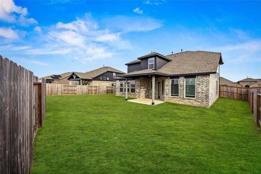 Exterior details and patio area of a home in River Ranch Meadows, Dayton (Image 3).