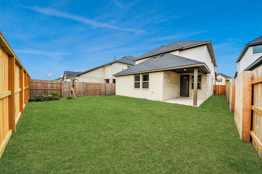 Exterior details and patio area of a home in Elyson, Katy (Image 20).