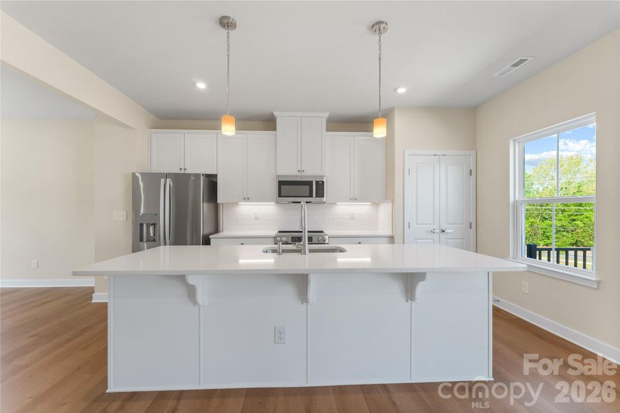 Furnished interior view inside a new home in Stowe Branch Townhomes, Charlotte (Image 5). Furnished interior view inside a new home in Stowe Branch Townhomes, Charlotte (Image 5).