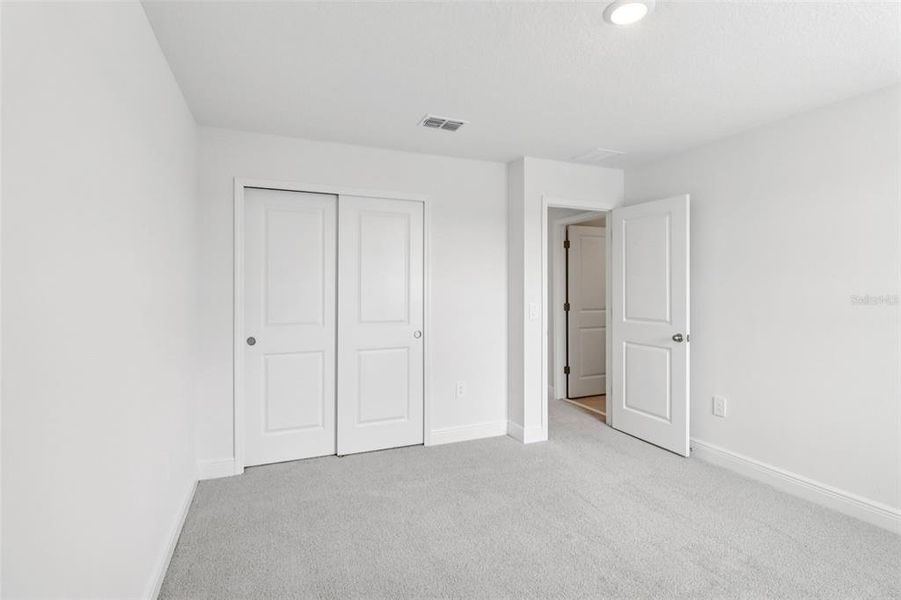 Spacious, unfurnished interior of a new home in The Reserve at Hammock Oaks - Classic Series, Lady Lake (Image 30). Spacious, unfurnished interior of a new home in The Reserve at Hammock Oaks - Classic Series, Lady Lake (Image 30).