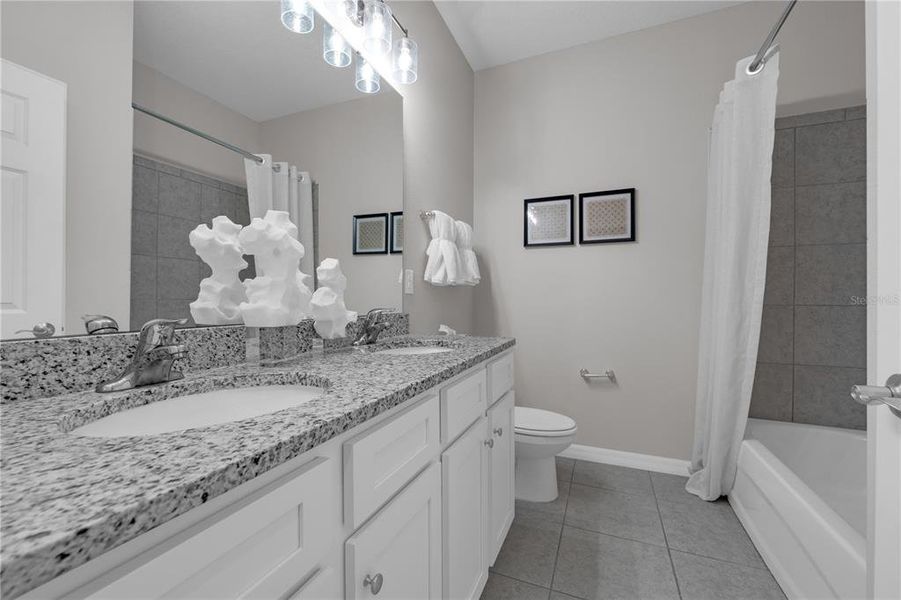 Furnished interior view inside a new home in Covered Bridge at Liberty Bluff, Haines City (Image 10).